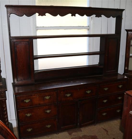 A late 18th century oak and mahogany crossbanded dresser